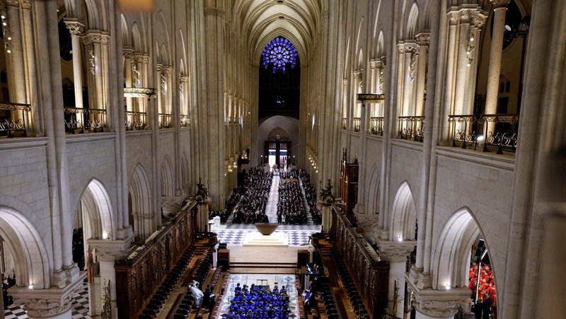 Attendees stand inside Notre Dame Cathedral in Paris Dec. 7, 2024, during a ceremony to mark its reopening following the 2019 fire. (OSV News/Ludovic Marin, pool via Reuters)