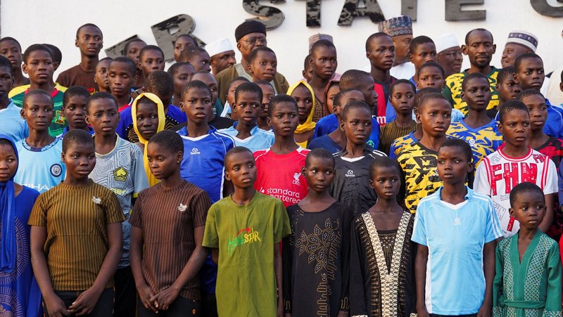 Schoolchildren from St. Mary's Catholic School in Papiri, Nigeria, pose for a photo at the Niger State Government House Dec. 8, 2025, after being freed from captivity following their abduction by gunmen Nov. 21. (OSV News photo/Marvellous Durowaiye, Reuters)