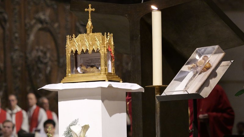 Relics of Father Maurice Rondeau, who was killed by German Nazis, are seen displayed as Cardinal Jean-Claude Hollerich of Luxembourg presides over the beatification Mass of 50 Catholic victims of German Nazis at Notre Dame Cathedral in Paris Dec. 13, 2025. The French martyrs, who were either priests and committed lay Christians, all died in Germany between 1944 and 1945. (OSV News photo/Yannick Boschat, courtesy Notre Dame Cathedral)