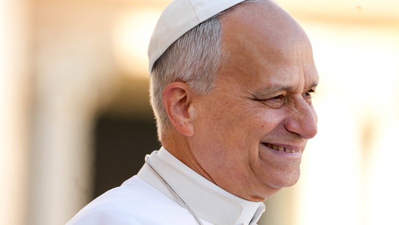 Pope Leo XIV smiles as he greets visitors from the popemobile as he rides around St. Peter's Square at the Vatican before his weekly general audience Dec. 10, 2025. (CNS/Lola Gomez)