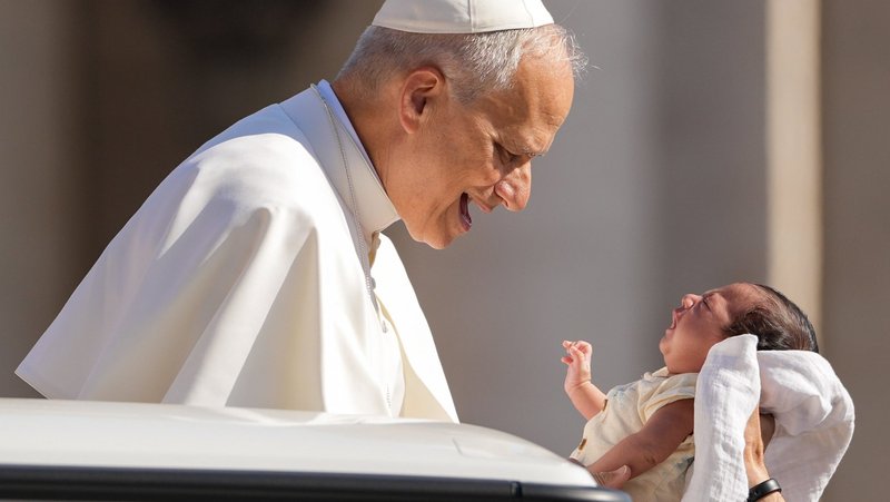 Pope Leo XIV greets a baby from the popemobile as he rides around St. Peter's Square at the Vatican before his weekly general audience June 25, 2025. On the eve of the 2026 March for Life in Washington Jan. 22, Pope Leo issued a message to participants, expressing his deep gratitude for their "eloquent public witness" and imparting his apostolic blessing. (CNS photo/Lola Gomez)