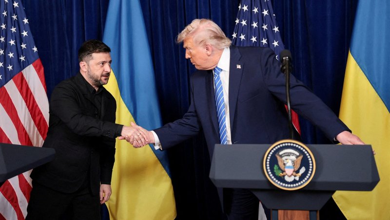 U.S. President Donald Trump and Ukrainian President Volodymyr Zelenskyy shakes hands during a news conference after their lunch meeting at Trump's Mar-a-Lago club in Palm Beach, Fla., Dec. 28, 2025. Trump said he believes both Zelenskyy and Russian President Vladimir Putin truly want peace, as he welcomed the "brave" Ukrainian leader for talks at his Florida resort. (OSV News photo/Jonathan Ernst, Reuters)
