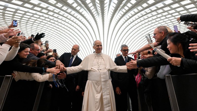 Pope Leo XIV greets people at the conclusion of his weekly general audience in the Paul VI Audience Hall at the Vatican Jan. 7, 2026. (CNS photo/Vatican Media)