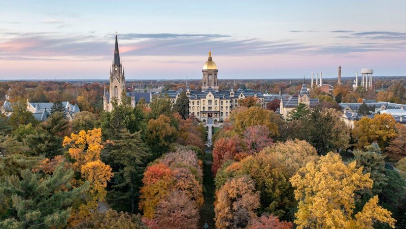 This is a 2021 aerial view of Main Building and Basilica of the Sacred Heart Steeple on the campus of the University of Notre Dame in South Bend, Ind. The city of Rochester, N.Y., in research partnership with the Lab for Economic Opportunities, or LEO, at the University of Notre Dame, announced in December its year-long Guaranteed Basic Income program was a success. More than 11,000 people applied for the city's GBI pilot, which ultimately selected 351 recipients through a lottery. (OSV News photo/Barbara Johnston/University of Notre Dame)