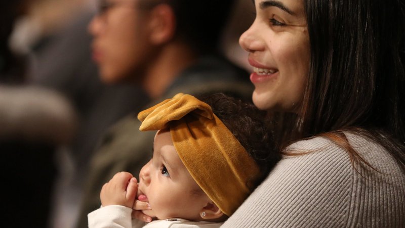 A woman holds her daughter during the opening Mass of the National Prayer Vigil for Life Jan. 19, 2023, at the Basilica of the National Shrine of the Immaculate Conception in Washington. Thousands of Catholics across the country will pray for the protection of human life starting on Jan. 16, 2026. (OSV News photo/Bob Roller)