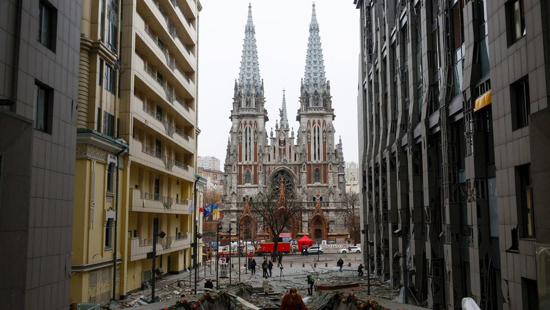People walk at the site of a Russian missile strike near St. Nicholas Catholic Church in Kyiv, Ukraine, Dec. 20, 2024, amid Russia's attack on Ukraine. After decades of legal disputes, delays and competing claims, Ukraine's Roman Catholic community has received the right to use Kyiv's historic St. Nicholas Church for the next 50 years, under an agreement signed with the state. (OSV News photo/Valentyn Ogirenko, Reuters)