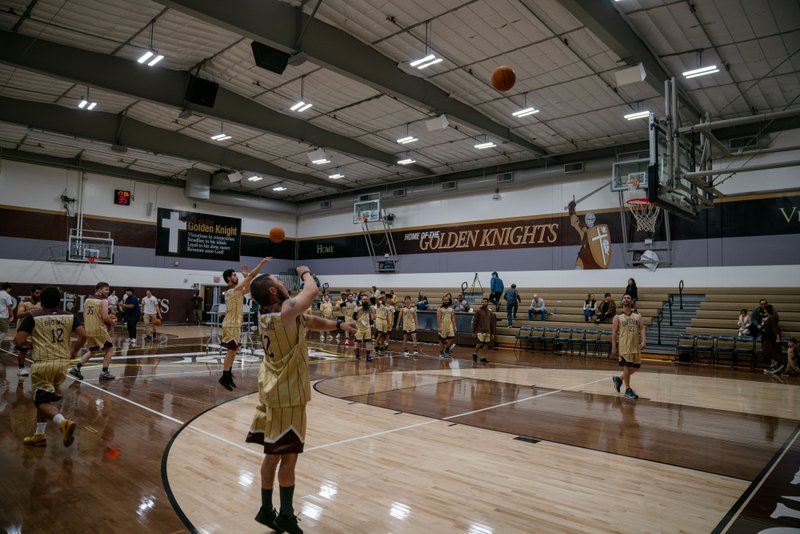 Game action as the Capuchin Franciscans play against the seminarians in the Archdiocese of Los Angeles' annual priests vs. seminarians basketball game, this year on Jan. 18 at St. Francis High School in La Cañada Flintridge. (John Rueda)