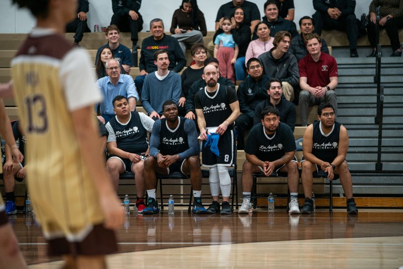 LA seminarians watch from the bench during the Archdiocese of Los Angeles' annual priests vs. seminarians basketball game, this year played against the Capuchin Franciscans on Jan. 18 at St. Francis High School in La Cañada Flintridge. (John Rueda)