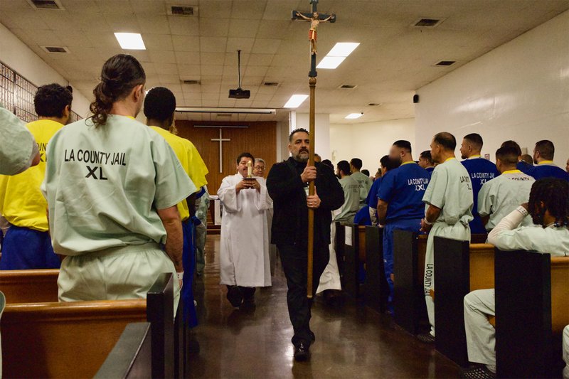 Auxiliary Bishop Matt Elshoff celebrates Christmas Day Mass with inmates at Men’s Central Jail near downtown LA. (Reese Cuevas)
