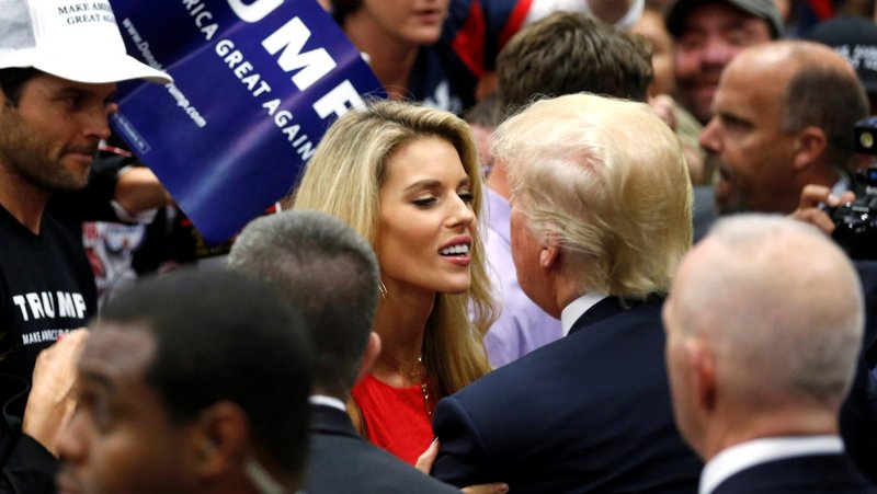 Then-Republican U.S. presidential candidate Donald Trump embraces former Miss California USA Carrie Prejean Boller, a Catholic, after a rally with supporters in San Diego May 27, 2016. Texas Lt. Gov. Dan Patrick said Feb.11, 2026, that he removed Prejean Boller from Trump's Religious Liberty Commission following a tense exchange during a hearing on antisemitism in America, accusing her of derailing the proceedings with remarks he characterized as anti-Israel and inappropriate for the forum. (OSV News photo/Jonathan Ernst, Reuters)