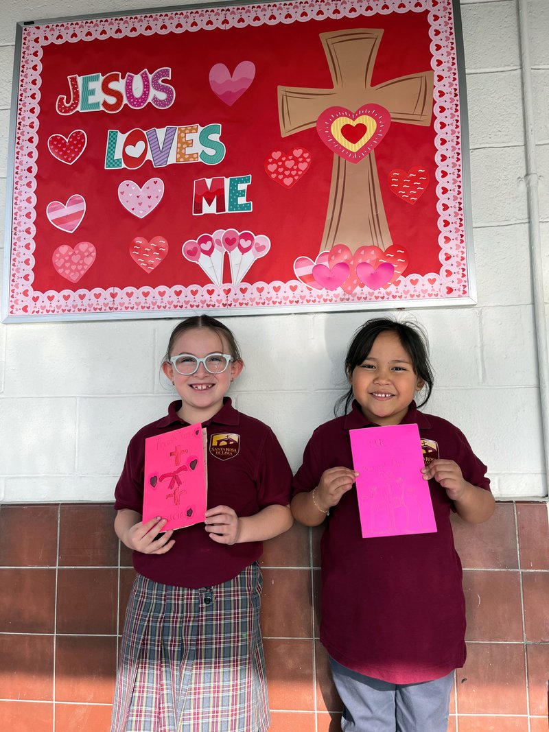 First-graders Valentina Avila and Elia Barba pose during Catholic Schools Week at Santa Rosa de Lima School in San Fernando. (Santa Rosa de Lima School)