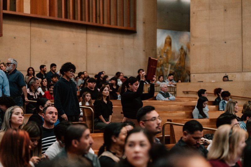 Catechists and catechumens process to the altar with the Book of the Elect during the Rite of Election ceremony at the Cathedral of Our Lady of the Angels on Feb. 15. (Peter Lobato)