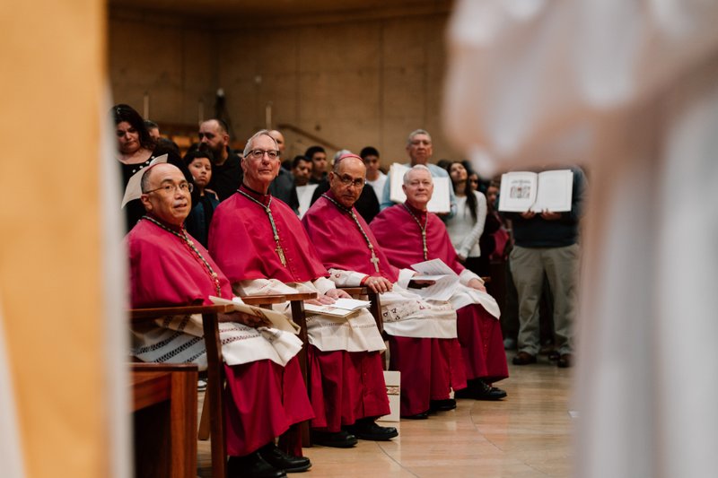 Auxiliary Bishops Brian Nunes, Marc Trudeau, Albert Bahhuth, and Matthew Elshoff look on during the Rite of Election ceremony at the Cathedral of Our Lady of the Angels on Feb. 15. (Peter Lobato)