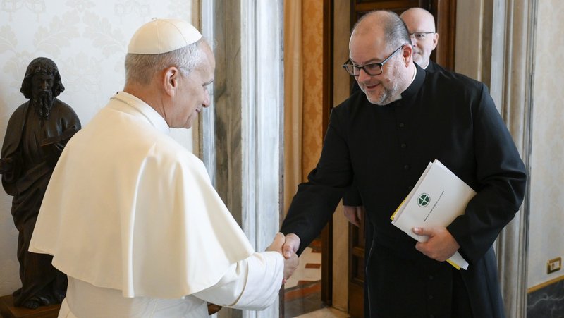 Pope Leo XIV greets Father Michael Fuller, general secretary of the U.S. Conference of Catholic Bishops, in the library of the Apostolic Palace at the Vatican Oct. 10, 2025. The USCCB announced March 10, 2026, that Pope Leo has bestowed the title of "monsignor" on Father Fuller. (CNS photo/Vatican Media)