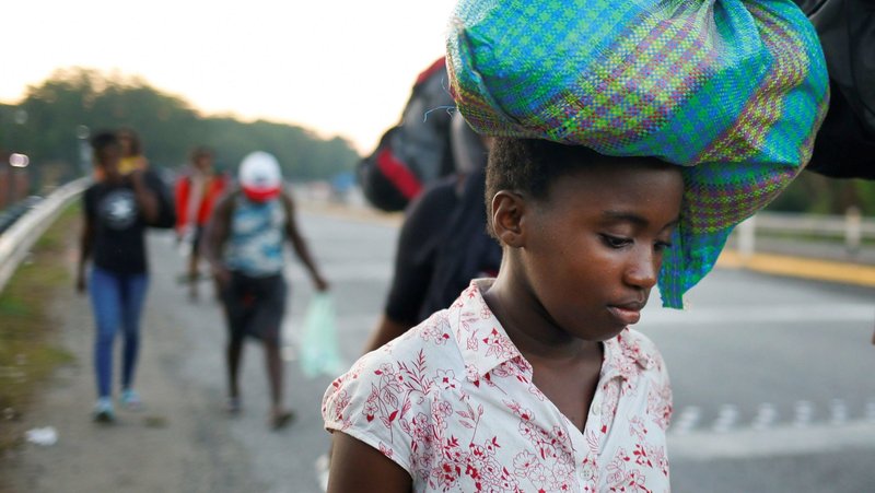 Migrants from Haiti near Huixtla, Mexico, are pictured in a file photo walking in a caravan heading to the U.S. border. The Trump administration has asked the Supreme Court to overrule a federal judge's ruling and allow it to end temporary protections for Haitians, a typically Catholic population, and send them back to the violence-wracked country. (OSV News photo/Jose Luis Gonzalez, Reuters)