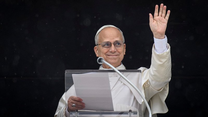 Pope Leo XIV waves as he leads the Angelus prayer from a window of the Apostolic Palace, at the Vatican, March 22, 2026. (OSV News/ Vatican Media, Matteo Pernaselci via Reuters)