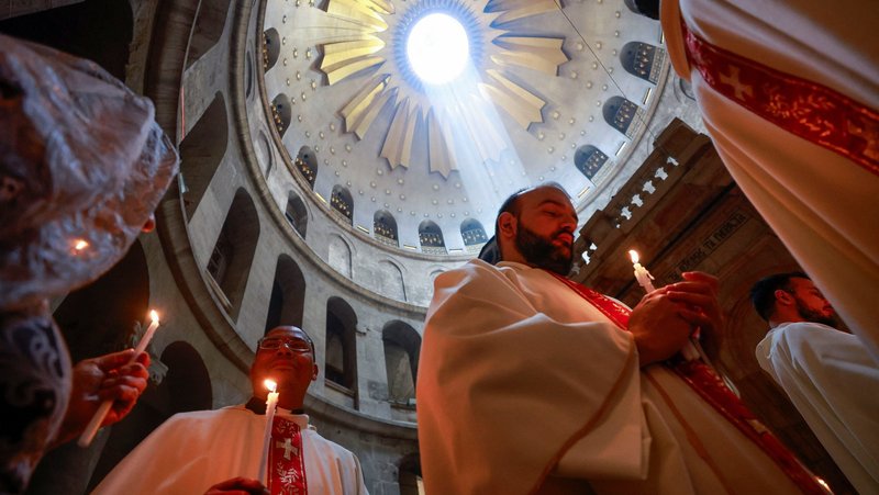 Members of the clergy take part in a procession during the washing of the feet ceremony on Holy Thursday in the Church of the Holy Sepulcher in Jerusalem's Old City April 17, 2025. As Holy Week 2026 approaches, the Church of the Holy Sepulcher remains a place of continuous prayer despite restricted access to the faithful, according to a statement released March 21 by the Custody of the Holy Land, which also said uncertainty persists over upcoming Holy Week and Easter celebrations. (OSV News photo/Ammar Awad, Reuters)