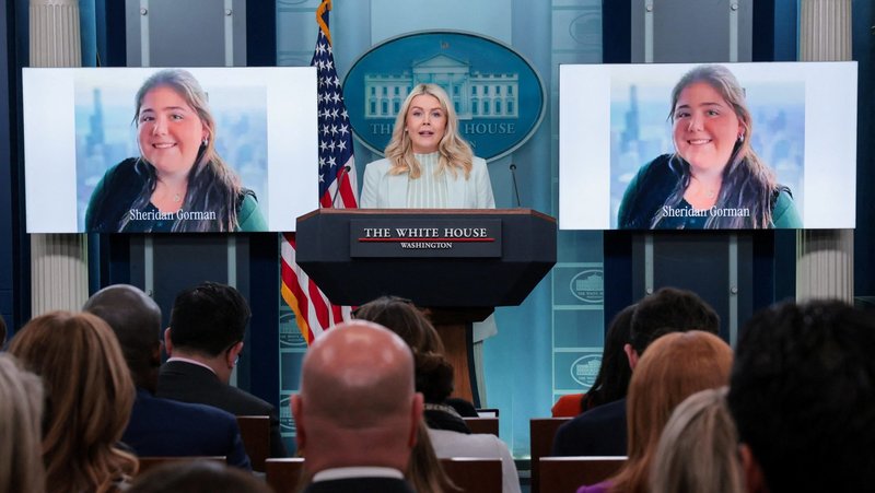 White House Press Secretary Karoline Leavitt holds a news briefing at the White House in Washington March 25, 2026, near photos of Loyola University Chicago student Sheridan Gorman. Catholics in Chicago have expressed sympathy and sorrow over the loss of Gorman, who was shot and killed March 19 near the school campus, an act of violence that also inflamed the immigration debate. (OSV News photo/Kylie Cooper, Reuters)