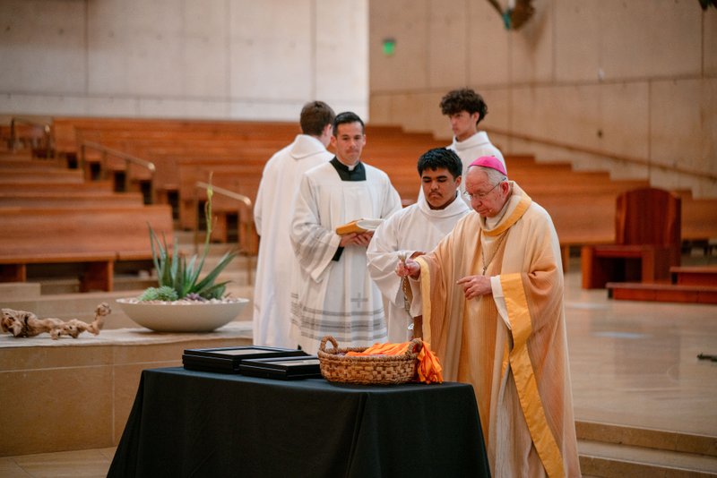 Archbishop José H. Gomez blesses the medals to be handed out to students during the 2026 Christian Service Awards Mass on March 10 at the Cathedral of Our Lady of the Angels. (John Rueda)