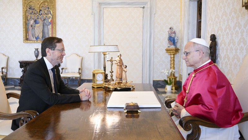 Pope Leo XIV and Israeli President Isaac Herzog meet in the library of the Apostolic Palace at the Vatican Sept. 4, 2025. Pope Leo spoke over the telephone with Herzog and Ukrainian President Volodymyr Zelenskyy April 3, 2026, Good Friday, urging diplomatic solutions and humanitarian support amid the ongoing wars in the Middle East and Europe. (CNS photo/Vatican Media)