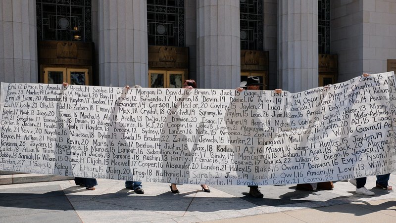 Parents who say they have lost their children due to social media hold up a banner with the children's names outside a Los Angeles court March 25, 2026, after the jury found Meta and Google liable in a key test case accusing Meta and Google's YouTube of harming children's mental health through addictive social media platforms. (OSV News photo/Mike Blake, Reuters)