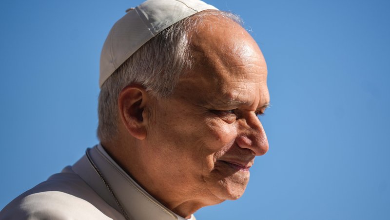 Pope Leo XIV smiles as he greets visitors and pilgrims from the popemobile while riding around St. Peter’s Square at the Vatican before his weekly general audience April 8, 2026. (CNS photo/Lola Gomez)