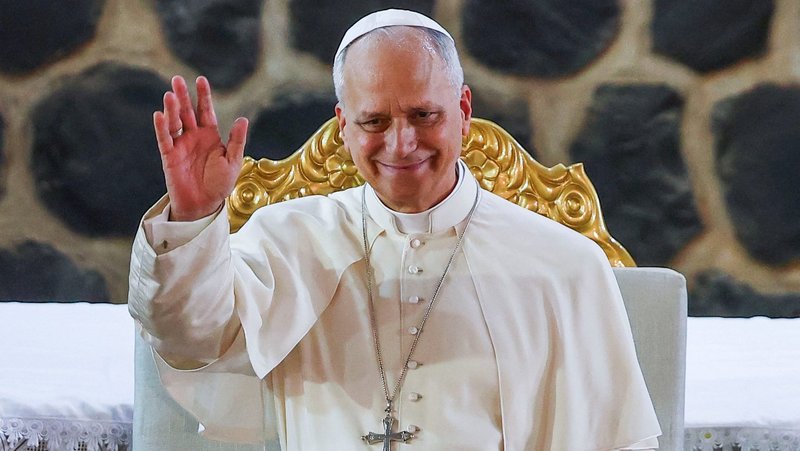 Pope Leo XIV waves as he attends a Meeting for Peace at St. Joseph's Cathedral in Bamenda, Cameroon, April 16, 2026. (OSV News photo/Guglielmo Mangiapane, Reuters)