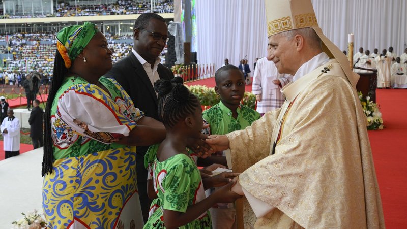 Pope Leo XIV greets a family as he celebrates the final Mass of his apostolic journey to Africa at Malabo Stadium in Equatorial Guinea April 23, 2026. (OSV News photo/Matteo Pernaselci, Vatican Media)