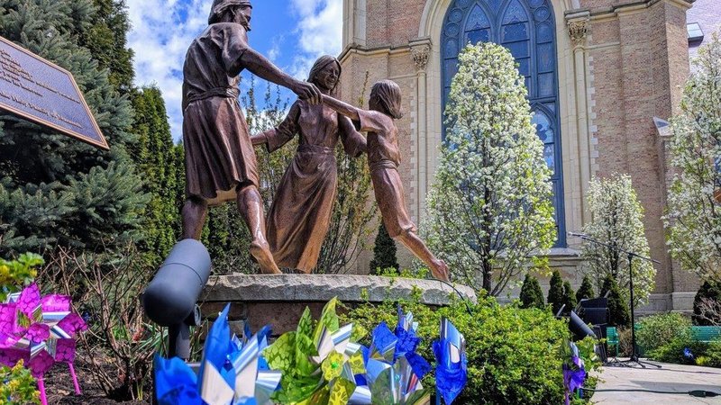 Pinwheels are seen planted in the Chicago Healing Garden in this 2014 photo. Plans for a similar garden are underway at The Catholic University of America in Washington, with organizers hoping to raise $200,000 by spring 2027 to fund an area to include the flowers, shrubbery, seating, plaques and a prayer labyrinth. Such gardens can be found all around the country and aim to bring healing to victim/survivors of abuse. (OSV News photo/courtesy of St. Ignatius College Prep)