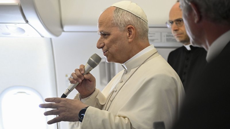 Pope Leo XIV speaks to journalists aboard a flight returning to Rome April 23, 2026, at the conclusion of his 11-day apostolic journey to Africa. (OSV News photo/Simone Risoluti, Vatican Media)