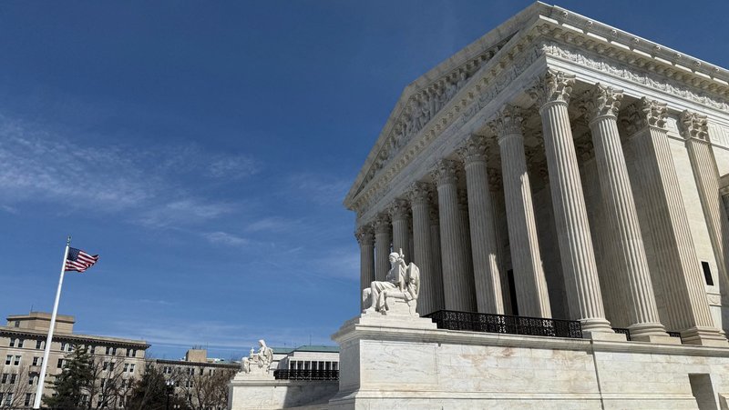 A U.S. flag flutters outside the U.S. Supreme Court building in Washington March 14, 2026. The U.S. Supreme Court ruled April 29 that a group of faith-based pregnancy centers in New Jersey can challenge in federal court an investigation by that state's attorney general alleging they misled people about their services and seeking information about their donors. (OSV News photo/Will Dunham, Reuters)