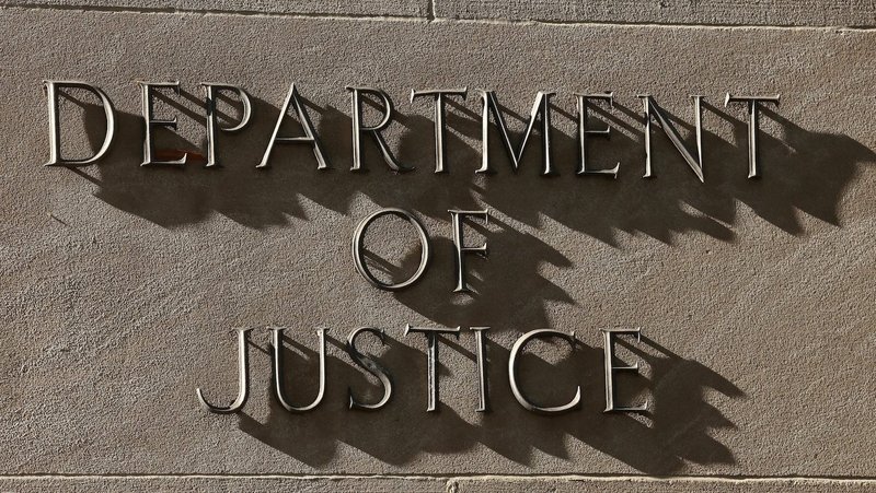 A sign for the U.S. Department of Justice in Washington is seen in this April 6, 2026, file photo. (OSV News photo/Kevin Lamarque, Reuters)