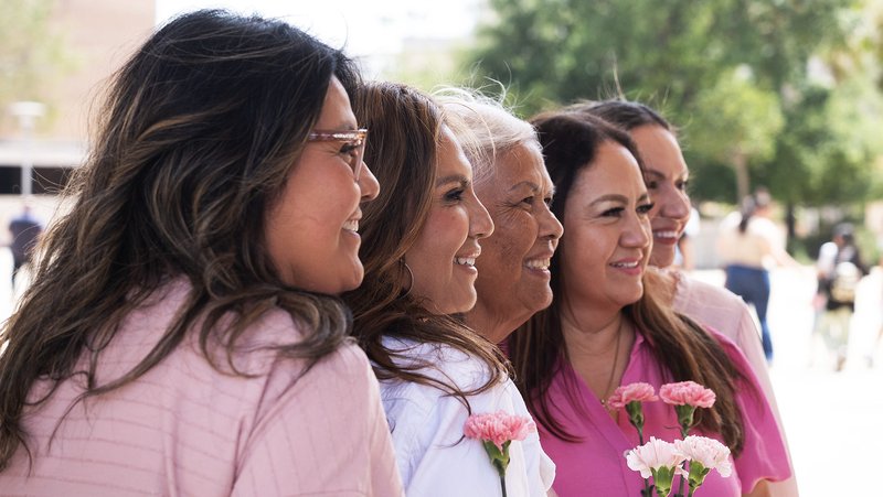 A group of women pose outside the Cathedral of Our Lady of the Angels in Los Angeles following the annual Mother’s Day Mass in 2025. (Victor Alemán)