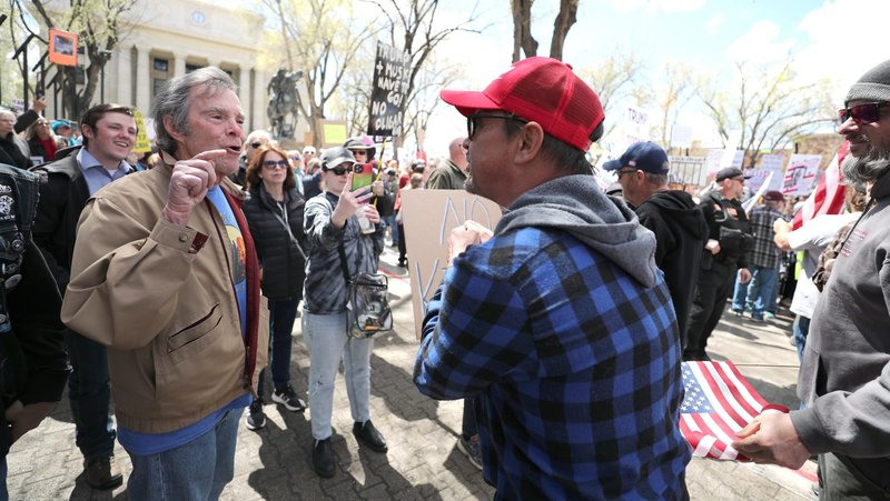 A protester confronts a counter-protester as a large crowd gathers outside the courthouse in Prescott, Ariz., April 5, 2025, to protest against U.S. President Donald Trump's administration. (OSV News/Bob Roller)