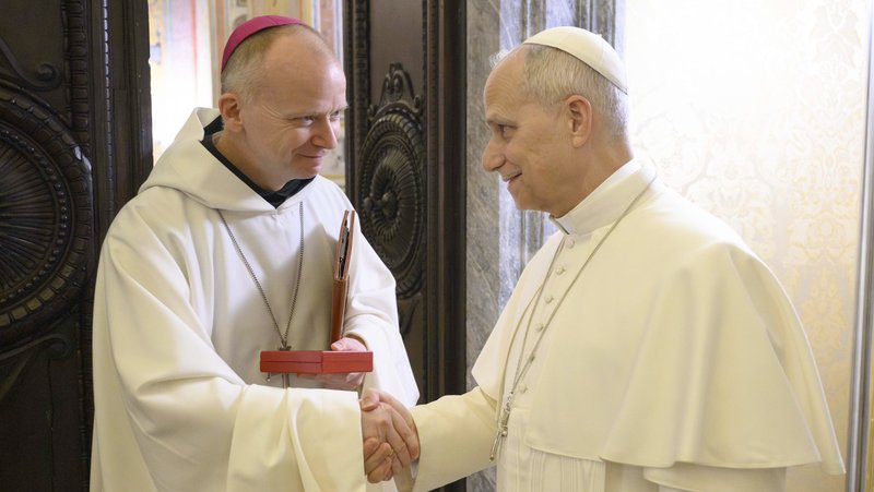 Pope Leo XIV greets Norwegian Bishop Erik Varden of Trondheim after the bishop led the final day of the Roman Curia's annual Lenten retreat in the Pauline Chapel at the Vatican Feb. 27, 2026. The Norwegian bishop was chosen by Pope Leo to preach at the Feb. 22-27 Lenten retreat, which reflected on the theme, "Illuminated by a Hidden Glory." (OSV News photo/Simone Risoluti, Vatican Media)