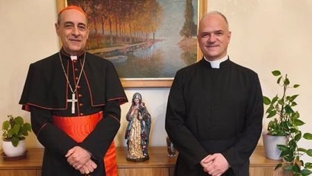 Cardinal Víctor Manuel Fernández, prefect of the Dicastery for the Doctrine of the Faith, and Father Davide Pagliarani, superior general of the traditionalist Society of St. Pius X, are pictured at the Vatican Feb. 12, 2026. In a statement released May 13 by the Vatican press office, Cardinal Fernández said the planned consecration of new bishops by the SSPX would be considered "a schismatic act." (OSV News photo/courtesy Dicastery for the Doctrine of the Faith) Editors: best quality available.