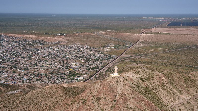 An aerial view shows a cross atop Mount Cristo Rey near the U.S.-Mexico border in Sunland Park, N.M., Aug. 8, 2025. The Diocese of Las Cruces has filed suit against the Trump administration, which is seeking to seize the site for portions of its border wall. (OSV News photo/Paul Ratje, Reuters)