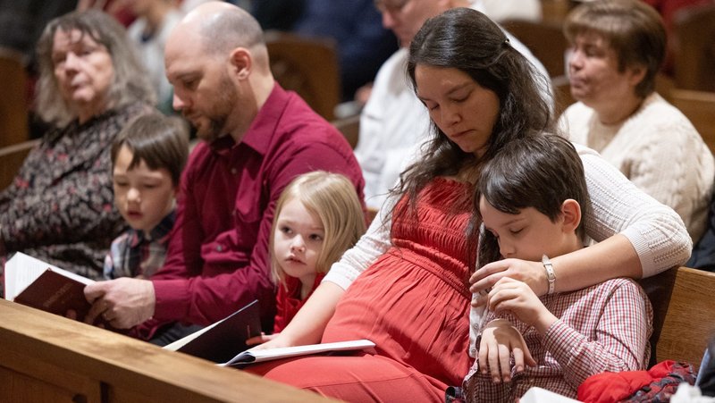 From left, Ambrose, Matthew, Avila, Victoria and Solomon Molko sit together for Mass at Holy Family in St. Louis Park, Minn., on Dec. 28, 2025, during a celebration of the 100th anniversary of the parish. Archbishop Bernard A. Hebda of St. Paul and Minneapolis marked the 10th anniversary of his installation as archbishop on May 13, 2026, with the release of a new pastoral letter to families, titled "Only One Thing Is Necessary." (OSV News photo/Dave Hrbacek, The Catholic Spirit)