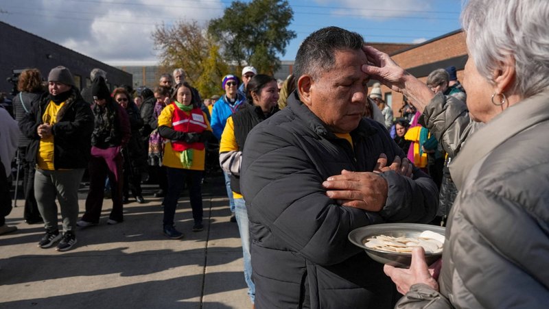 A man receives a blessing during a Mass Nov. 1, 2025, celebrated outside the Immigration and Customs Enforcement facility in Broadview, Ill. Leaders of the Coalition for Spiritual and Public Leadership said that with a judge's order May 15, 2026, some of their members are now allowed into the Broadview ICE facility to minister to detainees daily. (OSV News photo/Leah Millis, Reuters)