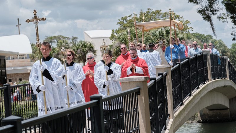 Bishop Erik T. Pohlmeier of St. Augustine, Fla., carries the Monstrance on his way to the Historic Chapel on the grounds of Our Lady of La Leche Shrine during the kickoff of the 2026 National Eucharistic Pilgrimage in St. Augustine May 24. (OSV News photo/George Martell)