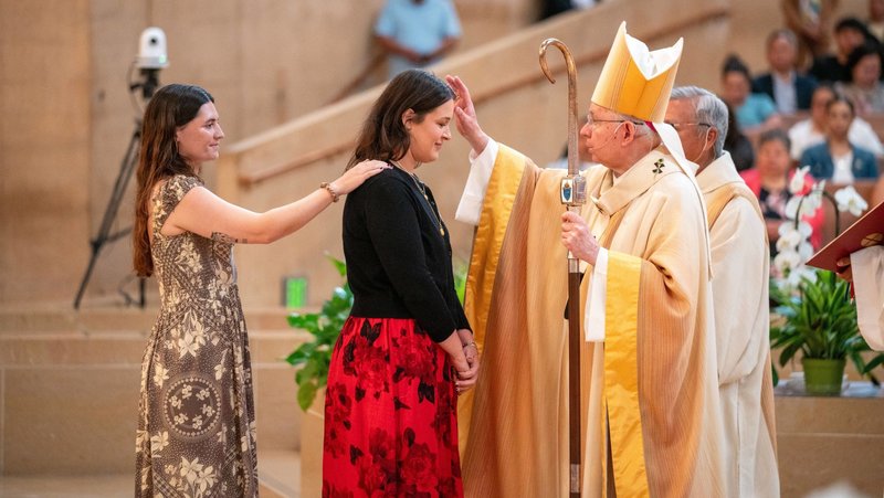 Archbishop José H. Gomez confirms a young LA Catholic at a Mass celebrating the solemnity of the Ascension May 17 at the Cathedral of Our Lady of the Angels. (John Rueda)