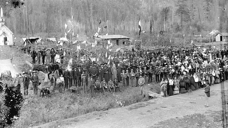 Bishop Pierre-Paul Durieu, Father Jean-Marie-Raphael Le Jeune, and the Very Rev. J.M. Fayard with a large group of Native Indians outside the Roman Catholic Church at North Bend, British Columbia, c. 1890. (Wikimedia Commons)