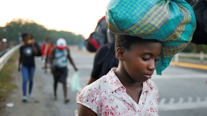 Migrants from Haiti near Huixtla, Mexico, are pictured in a file photo walking in a caravan heading to the U.S. border. (OSV News photo/Jose Luis Gonzalez, Reuters)