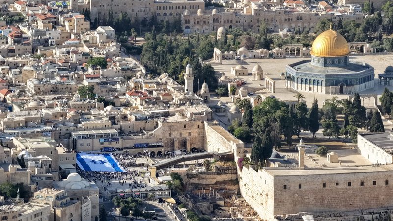 A drone view shows a large Israeli flag as people gather at the Western Wall Plaza in Jerusalem's Old City May 14, 2026, Judaism's holiest prayer site, during the annual Jerusalem Day. (OSV News photo/Ilan Rosenberg, Reuters)