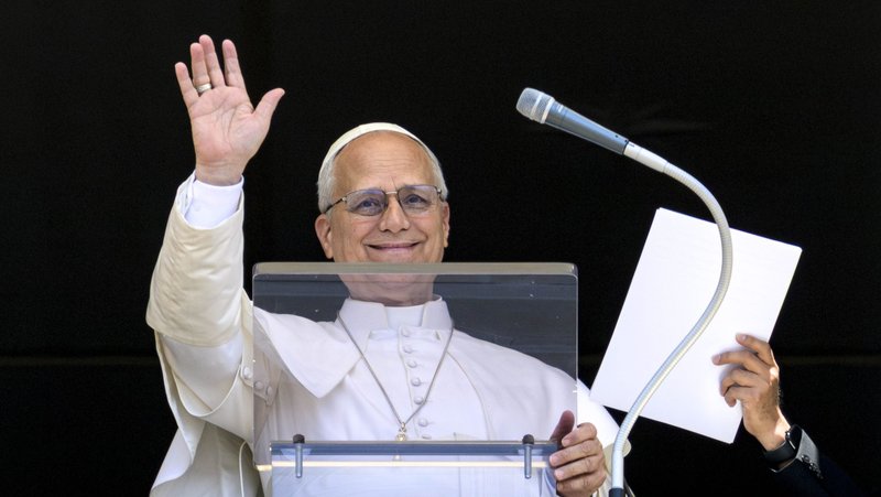 Pope Leo XIV waves to the crowd after leading the Angelus in St. Peter's Square at the Vatican May 31, 2026. (OSV News photo/Simone Risoluti, Vatican Media)