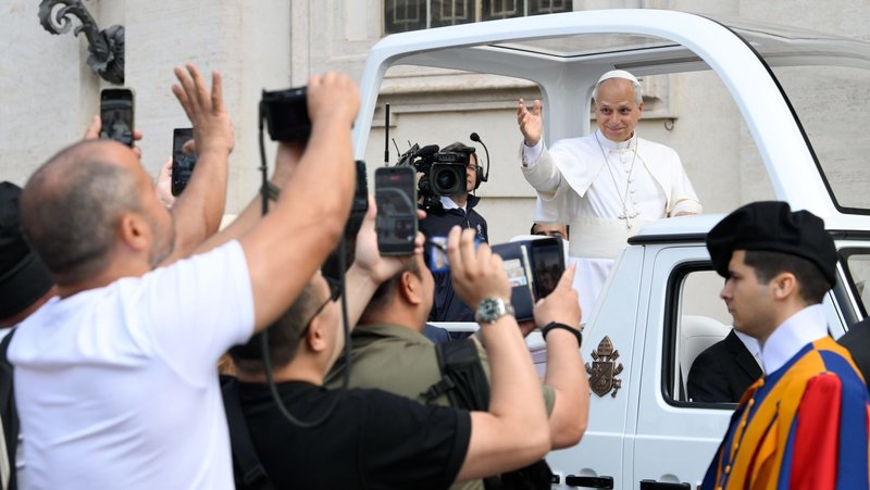 Pope Leo XIV greets visitors and pilgrims from the popemobile while riding around St. Peter’s Square at the Vatican before his weekly general audience June 3, 2026. (CNS photo/Vatican Media)