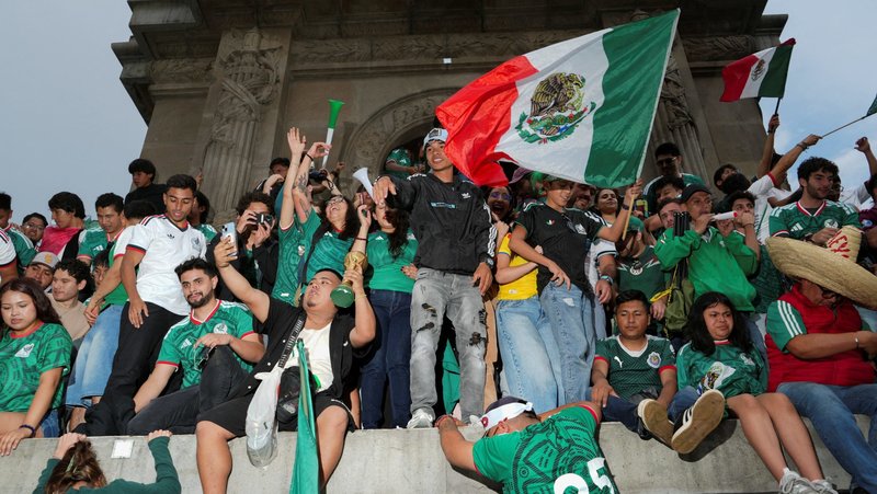 People celebrate Mexico's 2-0 victory following the FIFA World Cup's Group A soccer match between Mexico and South Africa in Mexico City June 11, 2026. (OSV News photo/Carlos Perez Gallardo, Reuters)