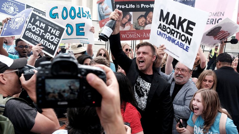 Pro-life demonstrators celebrate outside the U.S. Supreme Court in Washington June 24, 2022, as the court ruled in the Dobbs v. Jackson Women's Health Organization abortion case, overturning the landmark Roe v. Wade decision. On the fourth anniversary of the Dobbs decision June 24, 2026, the U.S. bishops' pro-life chair and pro-life leaders pointed to abortion pills as among key challenges for protecting the lives of unborn children. (OSV News photo/Evelyn Hockstein, Reuters)
