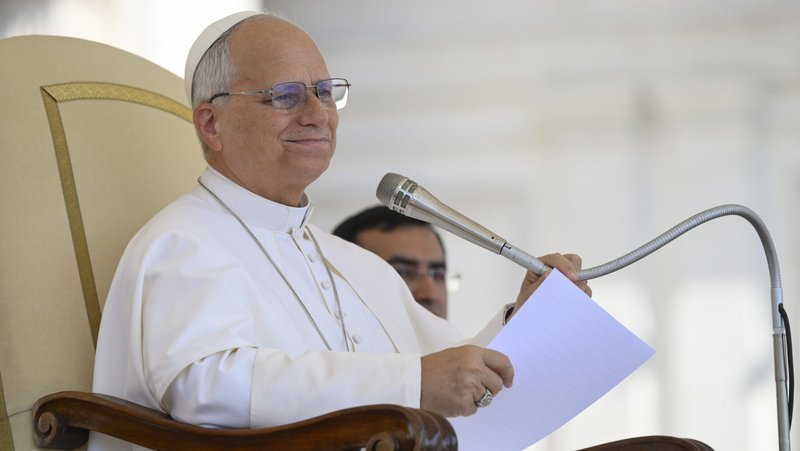 Pope Leo XIV talks to visitors and pilgrims during his weekly general audience in St. Peter's Square at the Vatican June 24, 2026.(CNS photo/Vatican Media)
