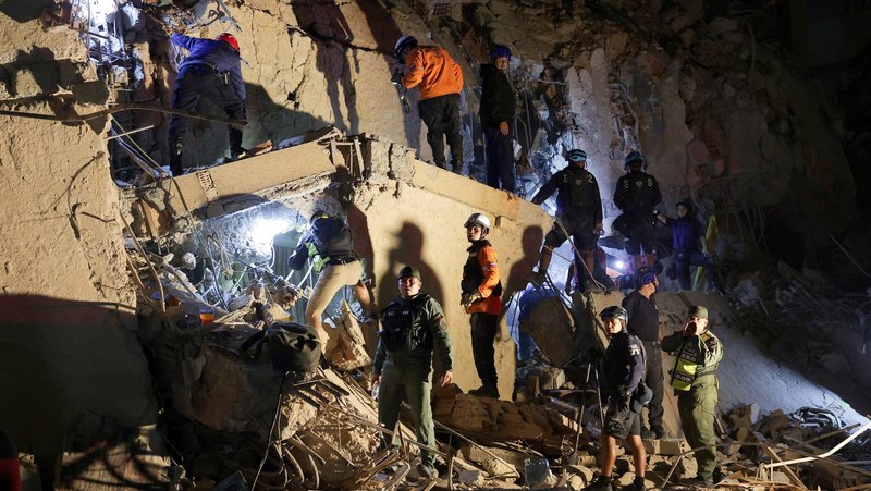 Emergency services work at the site of a collapsed building in Caracas, Venezuela, June 24, 2026, following 7.2 and 7.5 magnitude earthquakes that rocked the country. More than 150 people have died and hundreds have been injured, Acting President Delcy Rodríguez said June 25, adding that rescue teams were rushing to the hardest-hit areas to free people trapped under rubble. (OSV News photo/Gaby Oraa, Reuters)